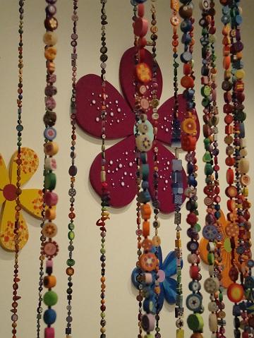 install - beadology (12).JPG - from within the curtain.  we moved the yellow wallflower after we finished installing this piece because the shadows interferred with the visuals
